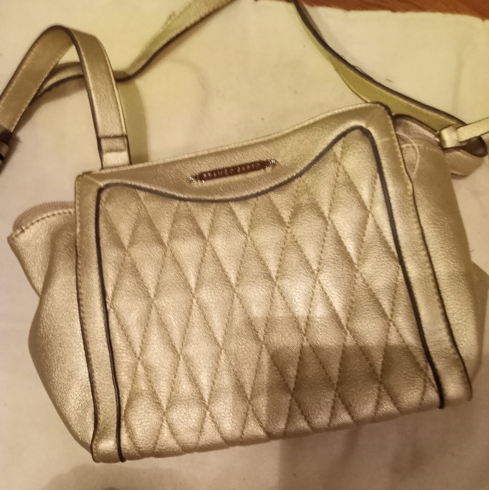 The stylish Franco sarto elegant bag will be a hit just click